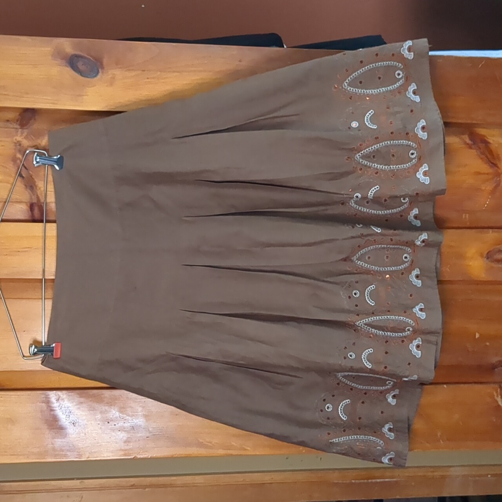 Side zip circle skirt pleated, decorative sequined border w/ embroidery detail
